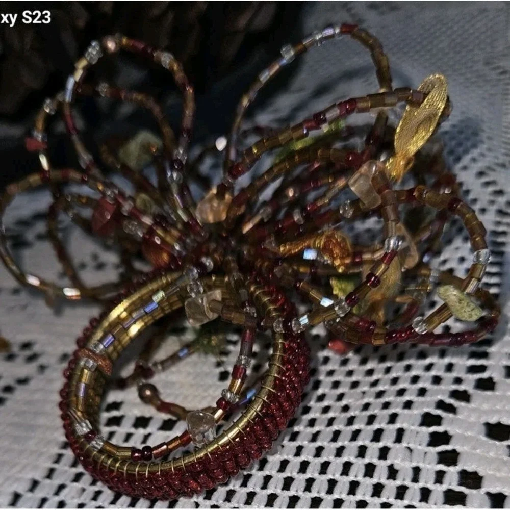 Pier One Set Of 7 Beaded Napkin Rings Fall Starburst Red‎ Brown Green Orange